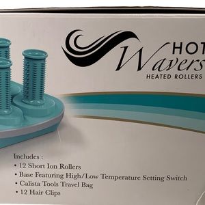 Hot Rollers By Calista with caring case. 12 rollers and 12 Clips.